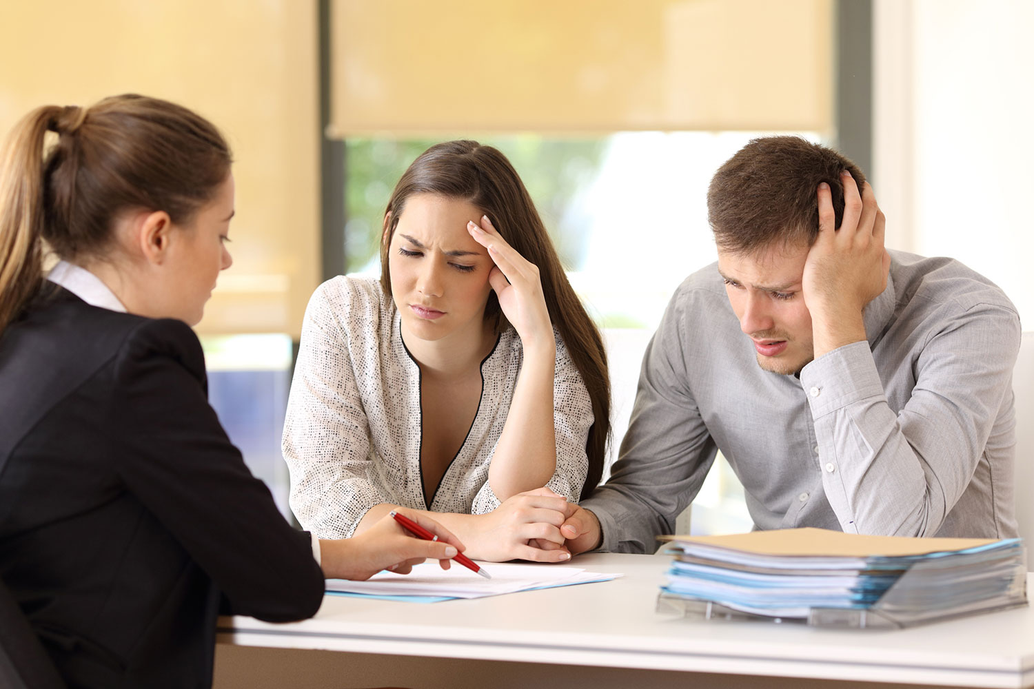 Couple wondering how to buy a home with bad credit