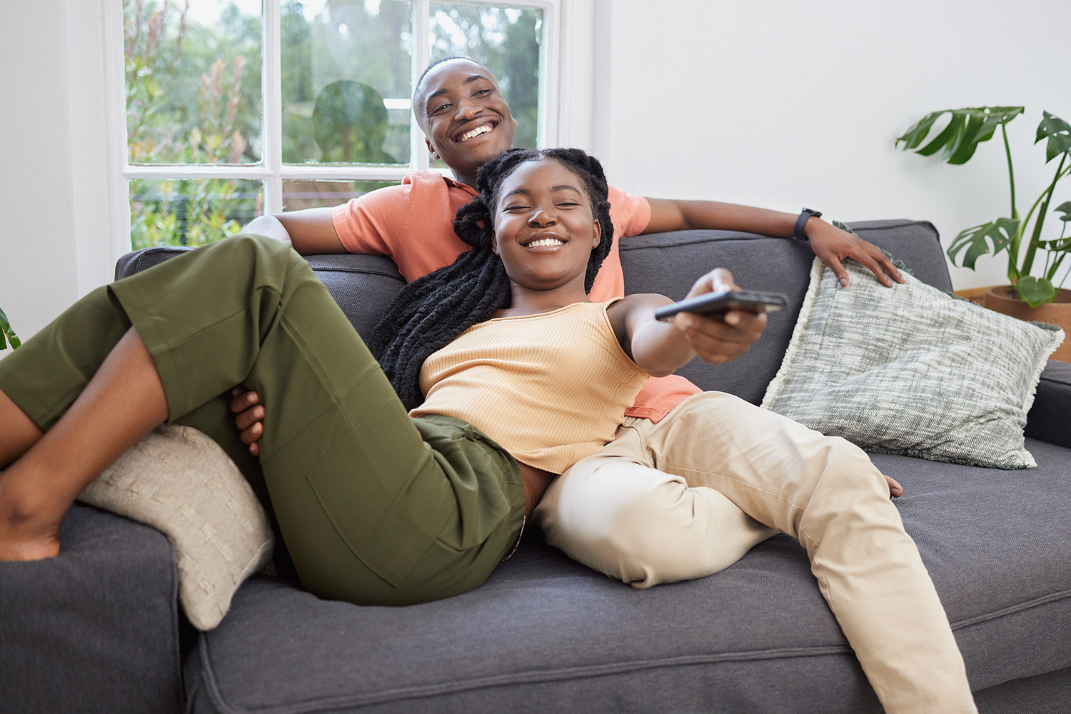 photo of a couple watching Hulu at home