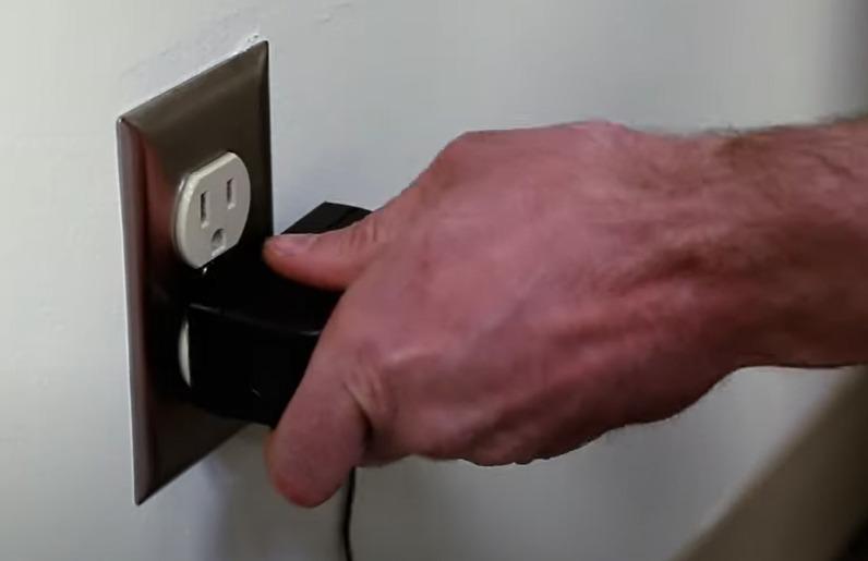 Plug in the power cord on the outlet
