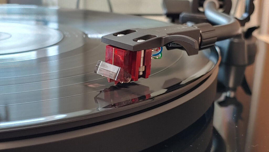 photo of a turntable playing a vinyl record