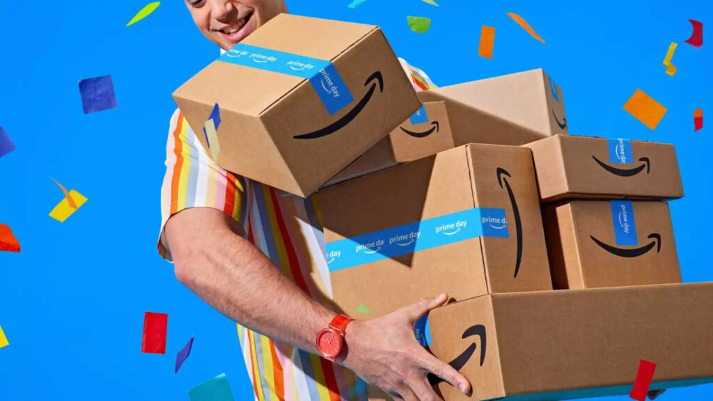 photo of a customer holding an armful of Amazon packages