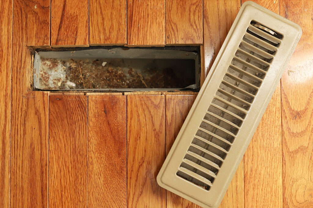 photo of a dirty vent in a home