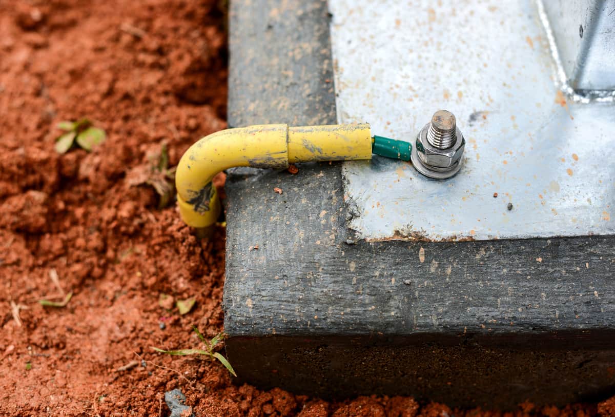 A ground wire attach to a concrete slab