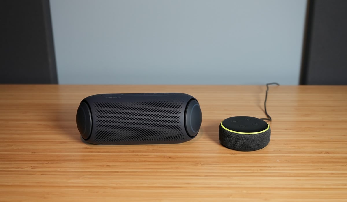 Amazon Echo Dot and Bluetooth Speaker on Table