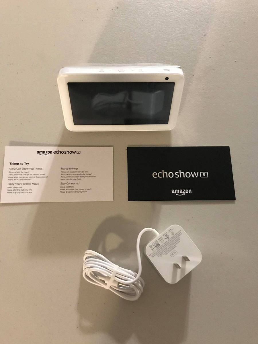 Echo Show 5 device booklet and power plug