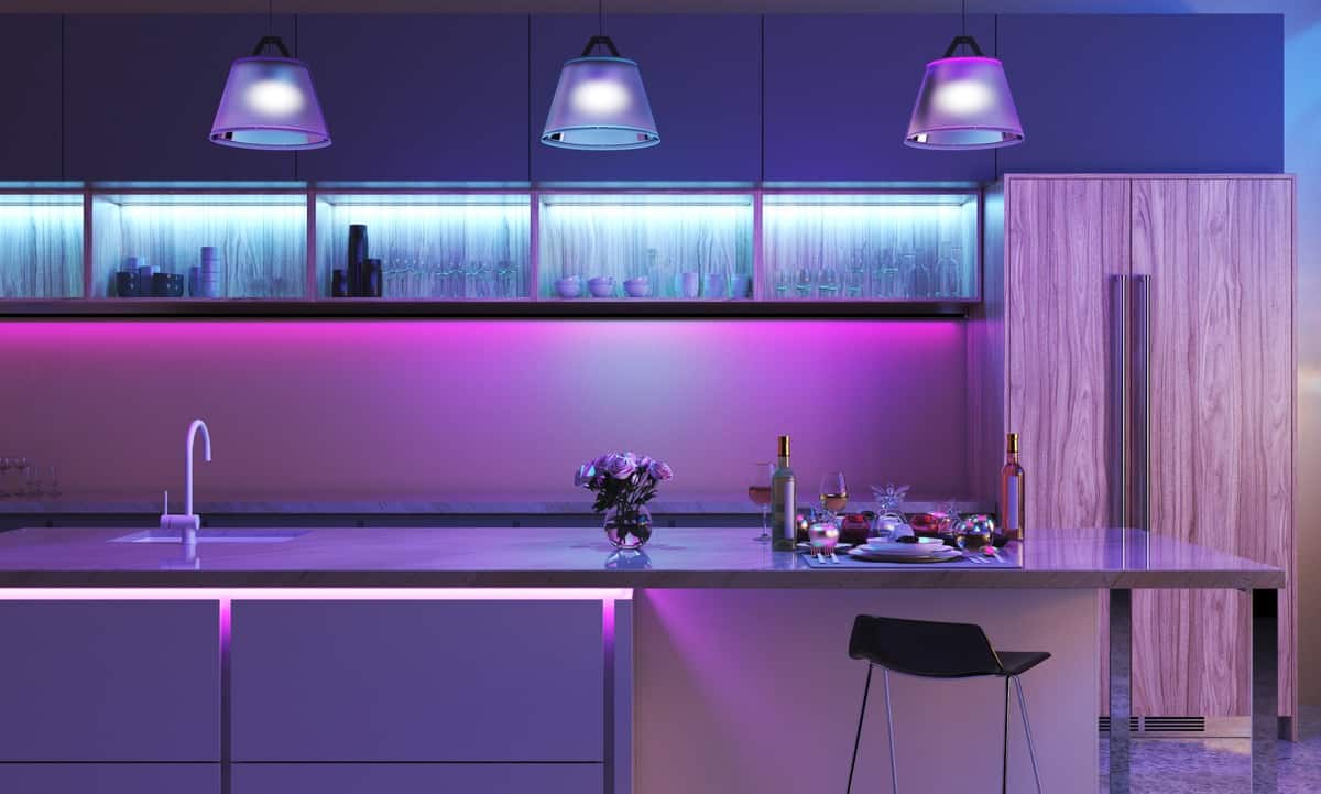 Kitchen with various smart lighting installed, and set to a purple-style color