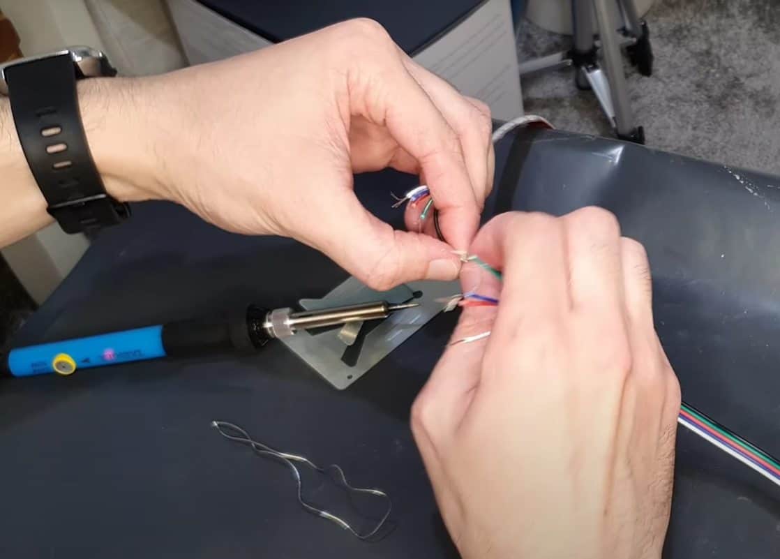 Me splicing and soldering some 5-pin lightstrip cable