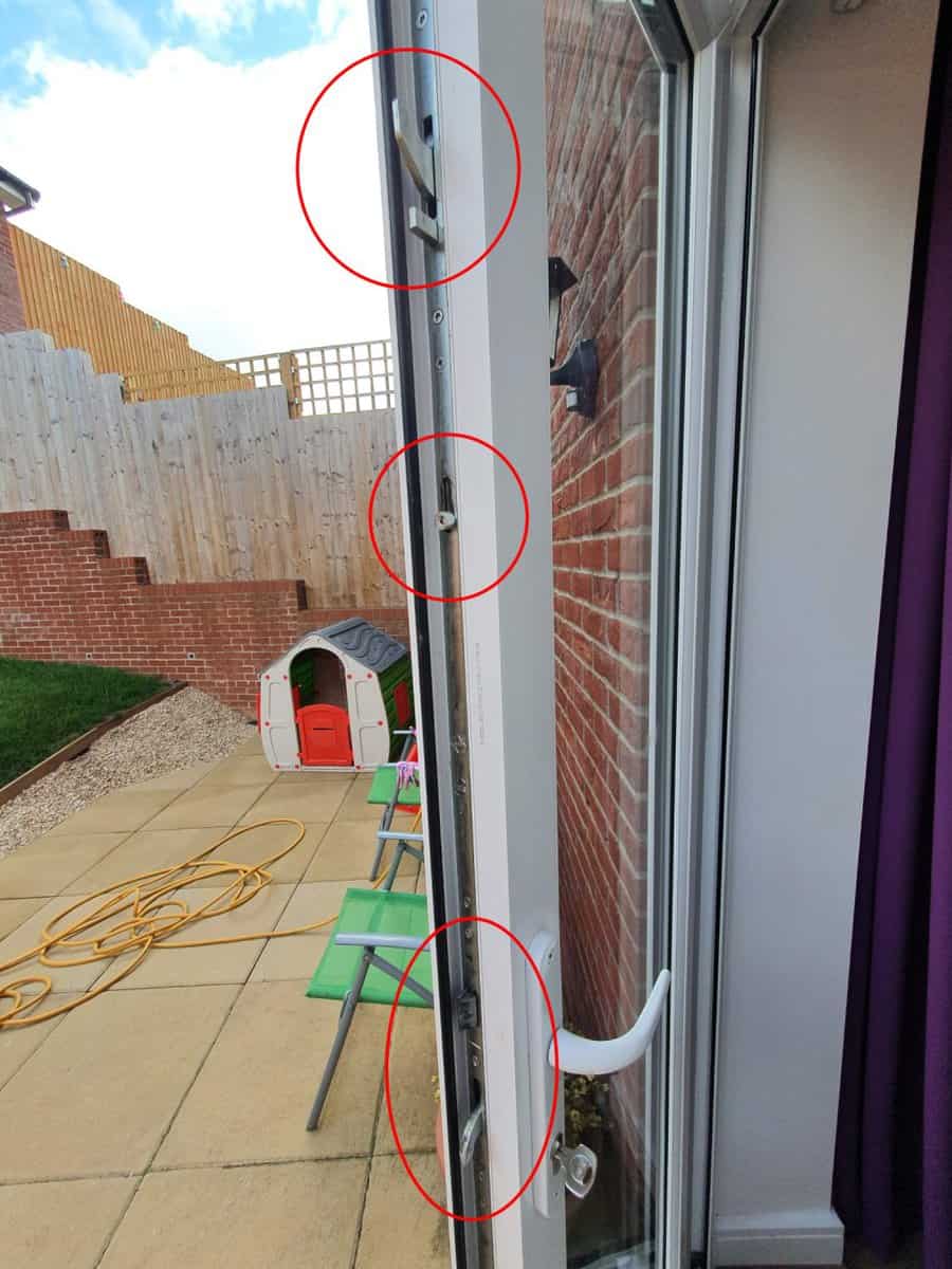 Three multipoint areas circled in a photo showing my UPVC back door (fitted with a multipoint door lock).