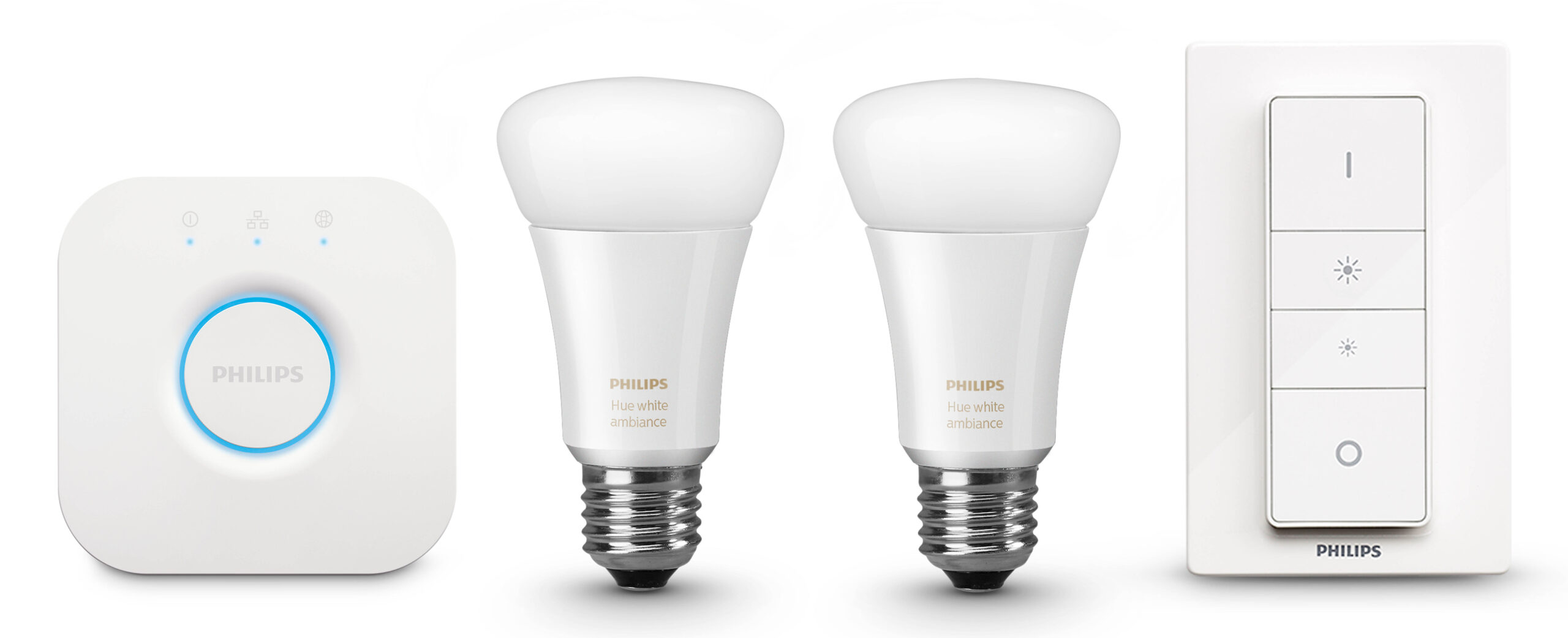 Philips Hue White Ambiance starter kit with the Home Hub on the left, two White Bulbs in the middle and a Smart Switch on the right.