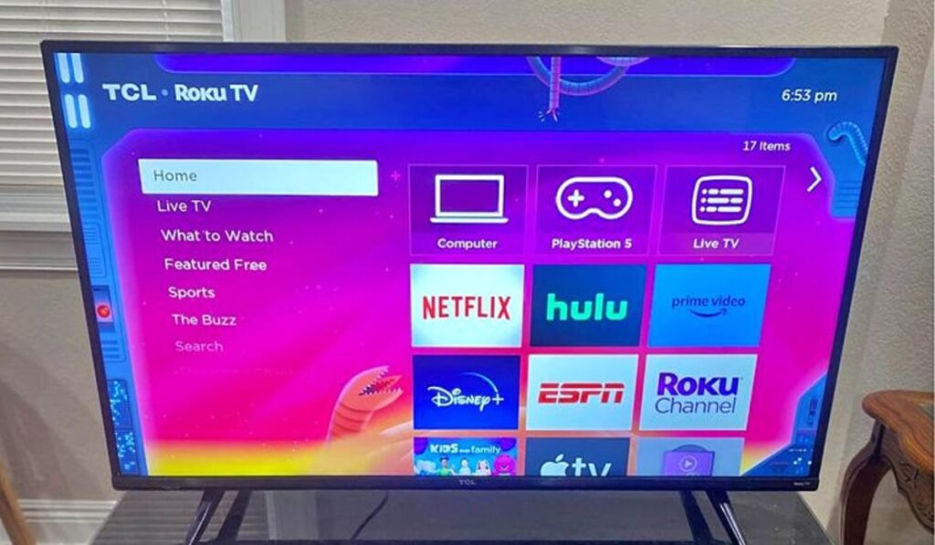 Roku TV on glass stand