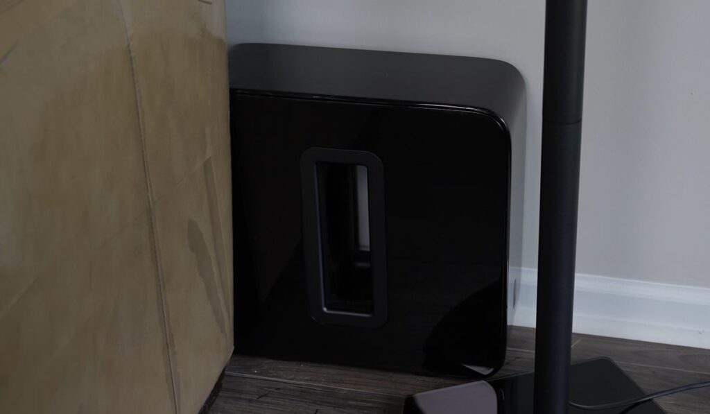 Sonos Subwoofer behind a living room couch