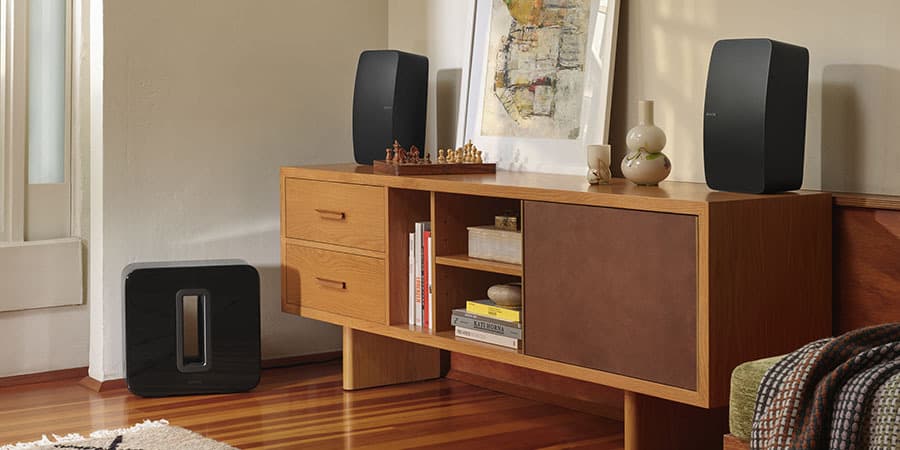 Pair of Sonos Five Speakers and Sonos Sub in a room.