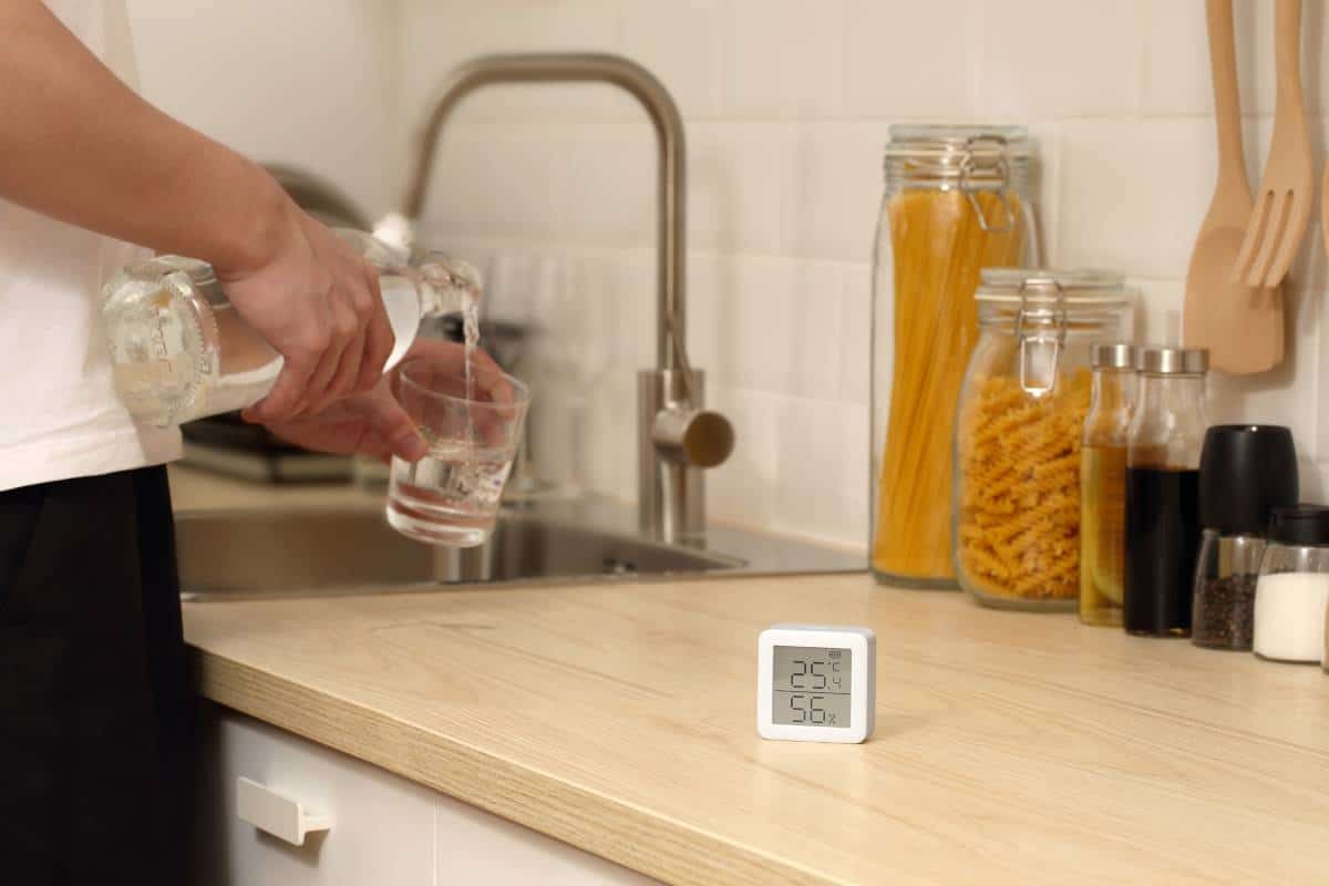 SwitchBot Meter in front of the kitchen sink