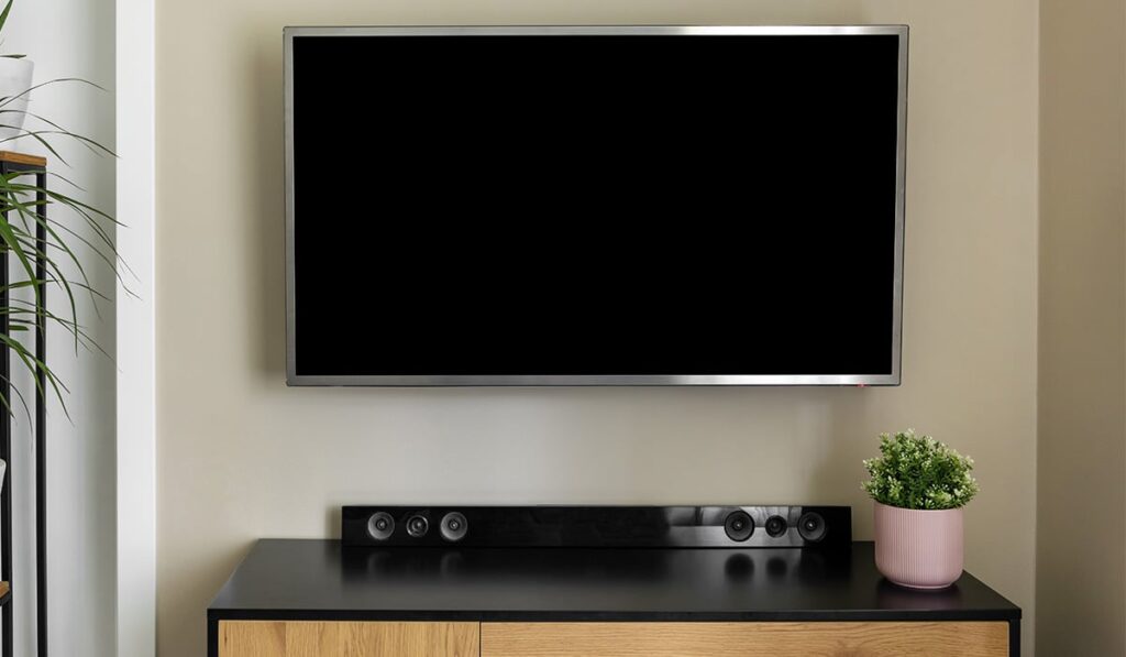 TV entertainment center with soundbar