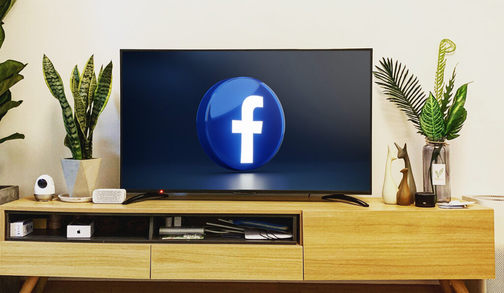 TV showing Facebook logo