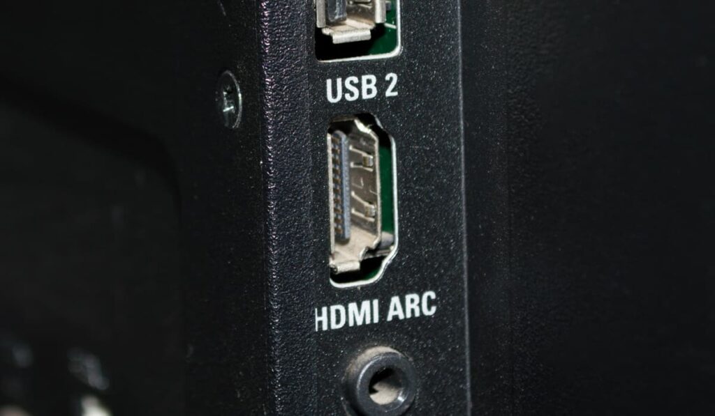 TV side details, with two usb inputs, one hdmi arc and headphone jack