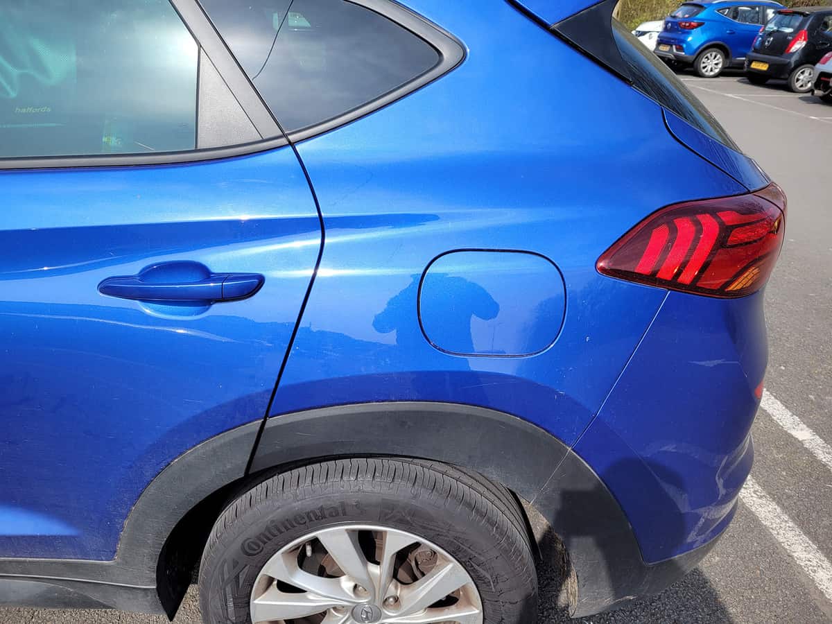 The fuel door on a petrol car