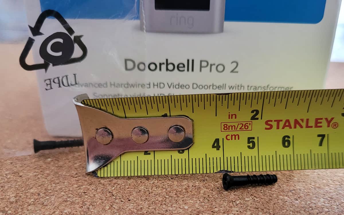 The length of the doorbell to mounting bracket screw