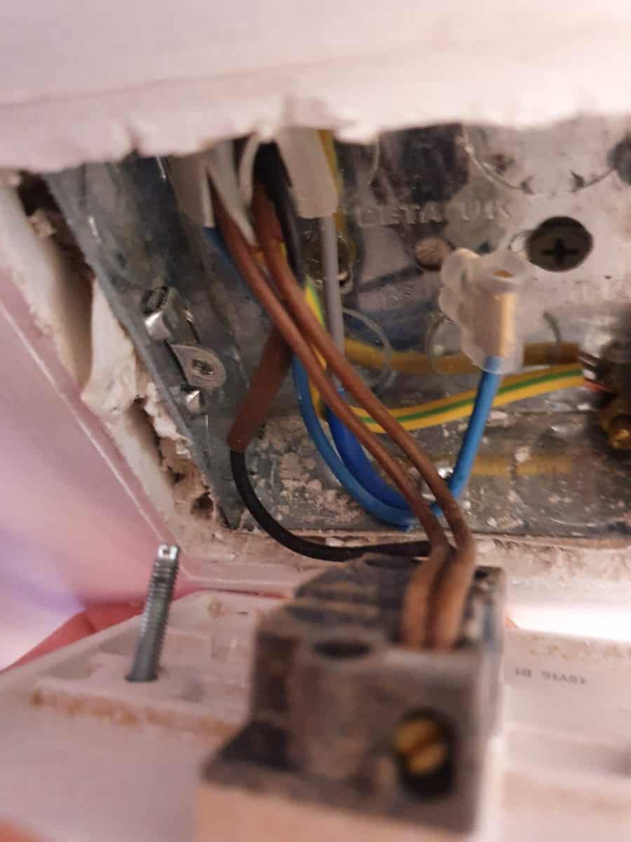 The wiring inside a UK light switch containing a neutral