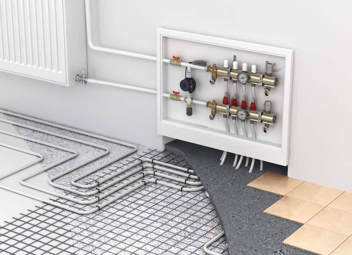 Diagram of water based underfloor heating, showing the heating manifold and the pipework going through the floor, and spread out underfloor.