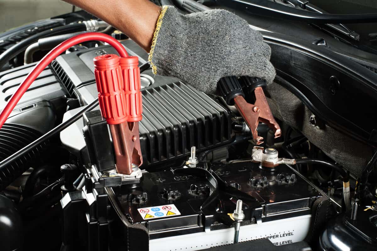 Using jumper cables to jump start a car battery