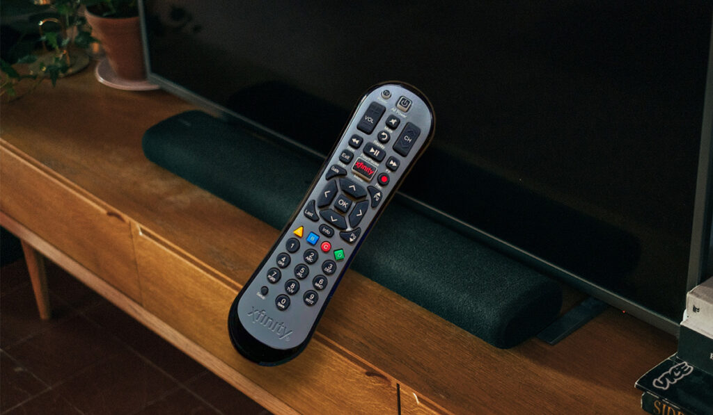 Xfinity Remote over entertainment center with sound bar