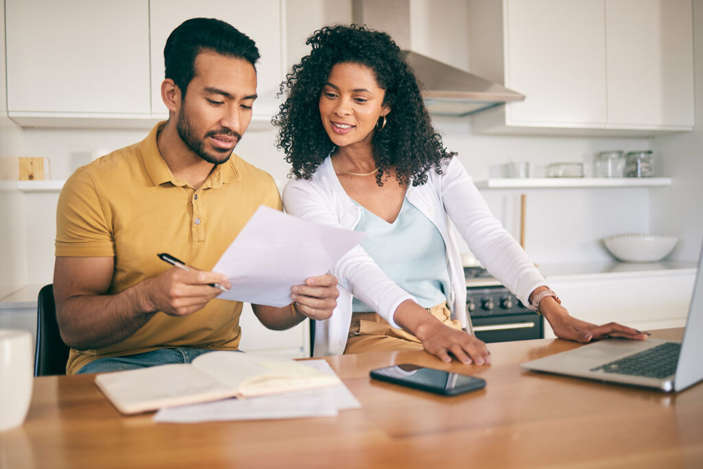 photo of a happy couple saving money with Ownwell services