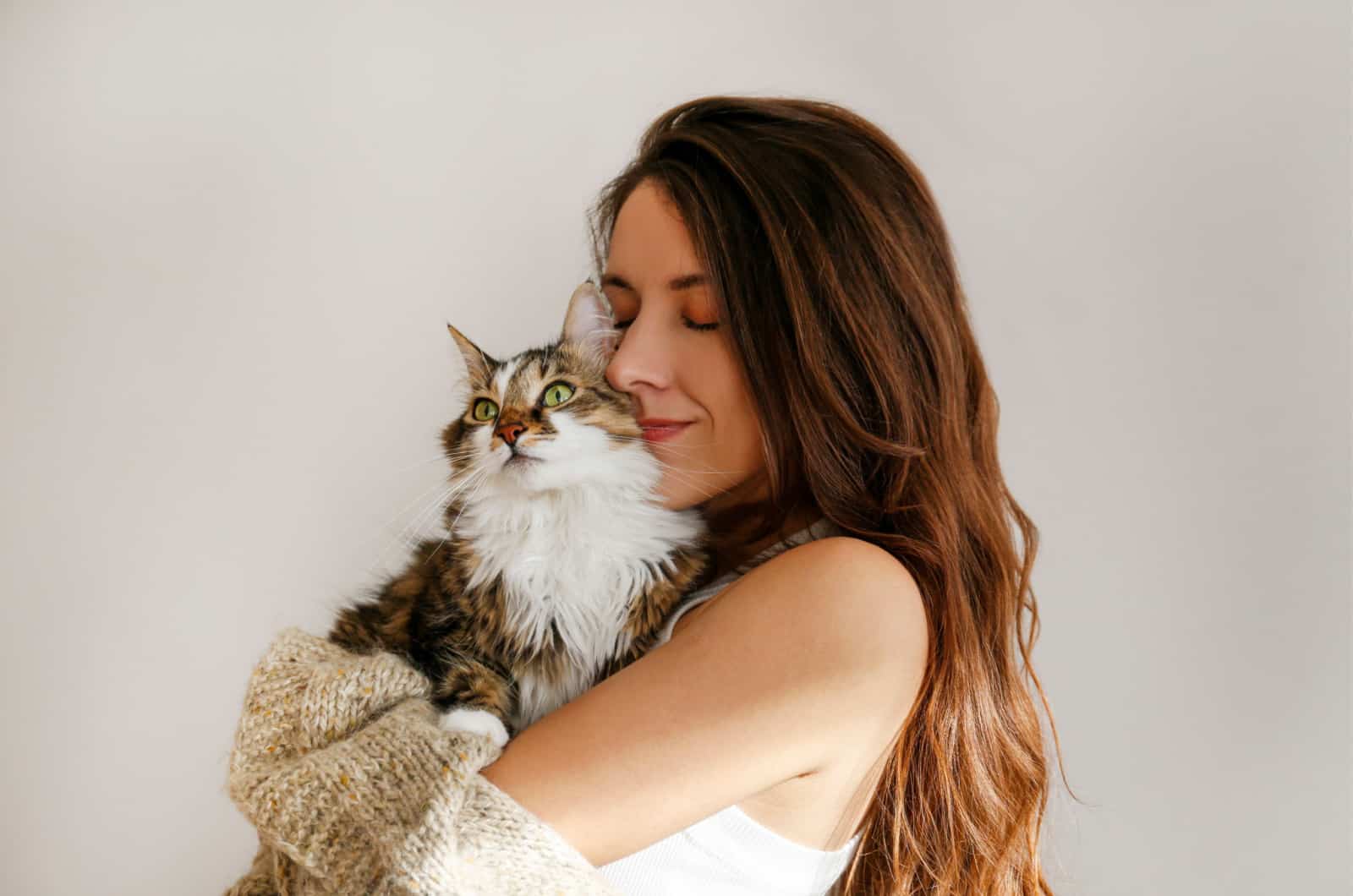 woman holding a cat