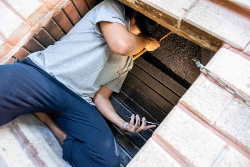 Cleaning the inside of a fireplace