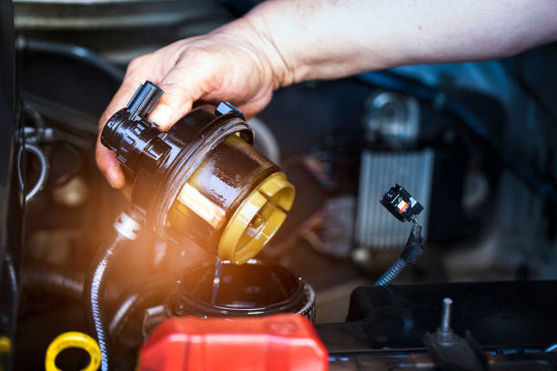 Mechanic Checking a Fuel Filter