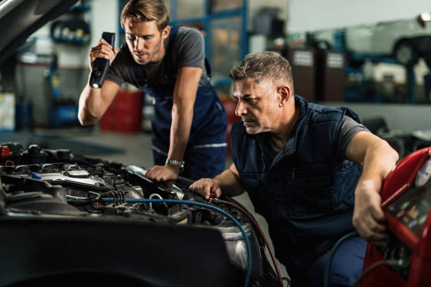 Mechanic Checking Car AC