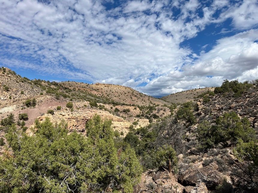 Cirrocumulus clouds in the sky above rocky hills near Moab, Utah