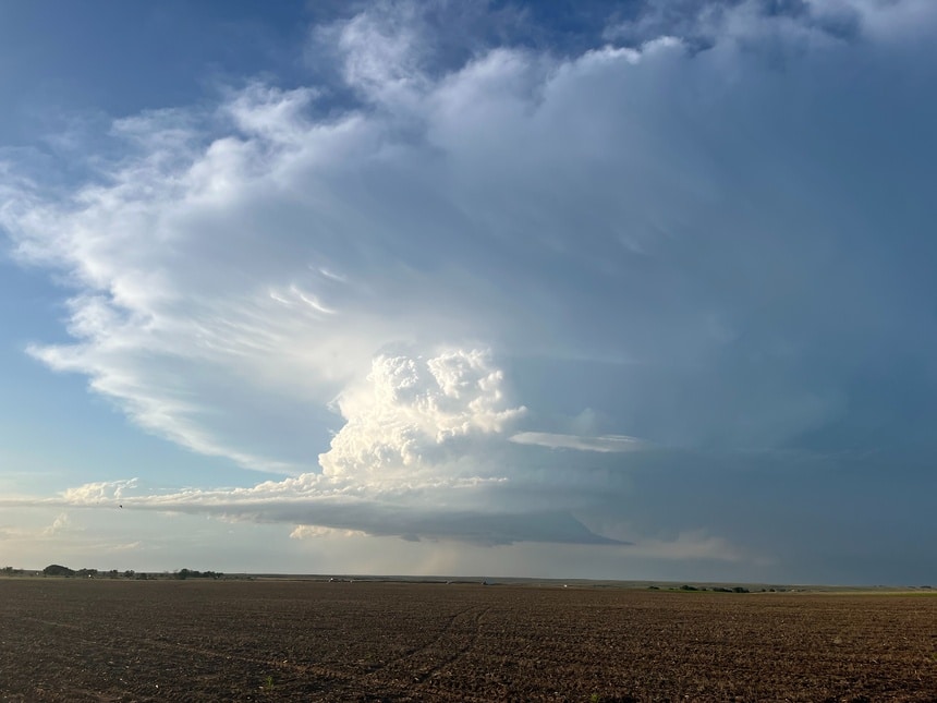 Cumulonimbus cloud above open fields in the Texas Panhandle