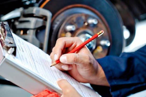 a man doing car inspection