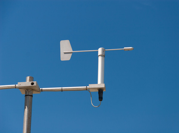 Wind vane being used to measure wind direction