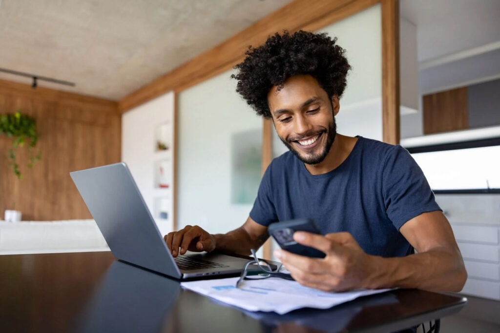 photo of a man enjoying his upgraded phone