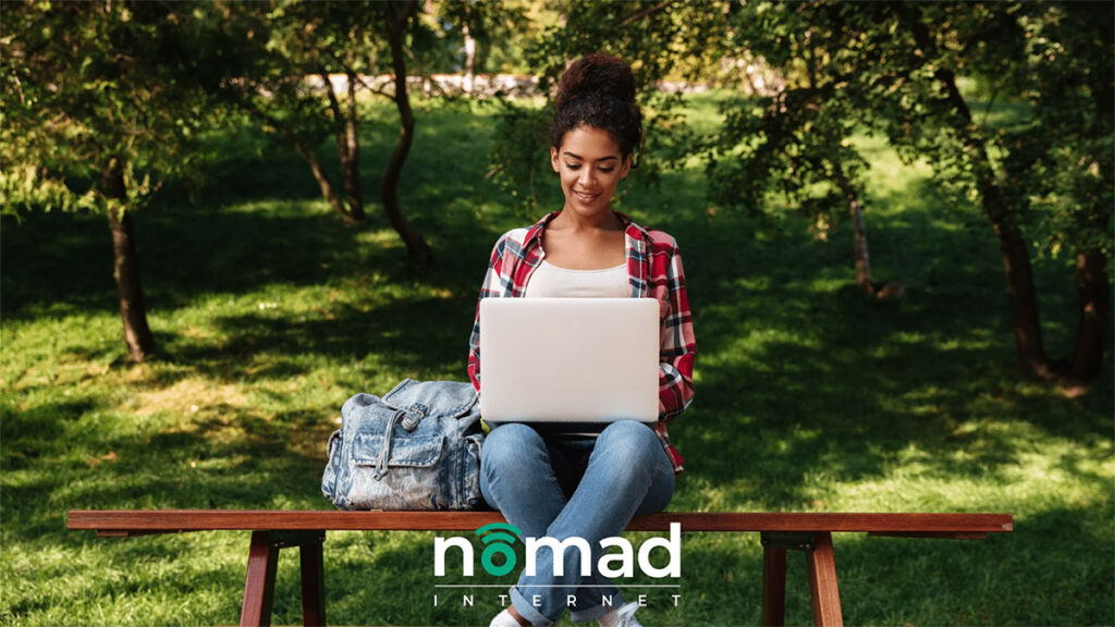 photo of a woman using Nomad Internet