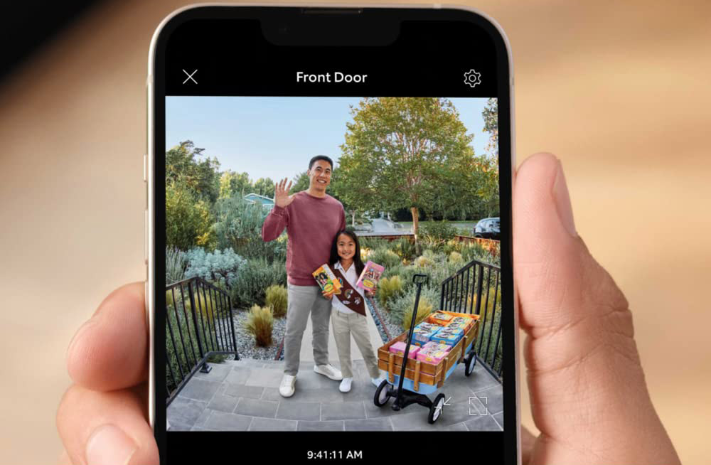 photo of people interacting with a Ring Doorbell